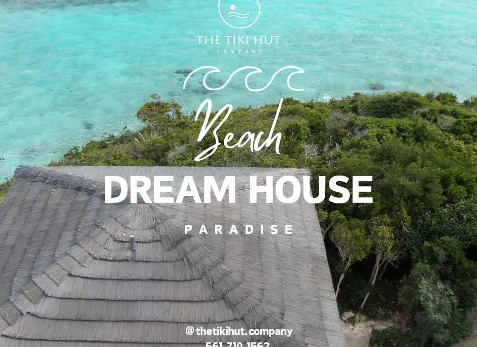 Beachfront view of a thatched-roof structure labeled "Dream House Paradise," surrounded by lush greenery and turquoise waters, promoting Tiki Hut Company's artificial thatch roofing solutions.